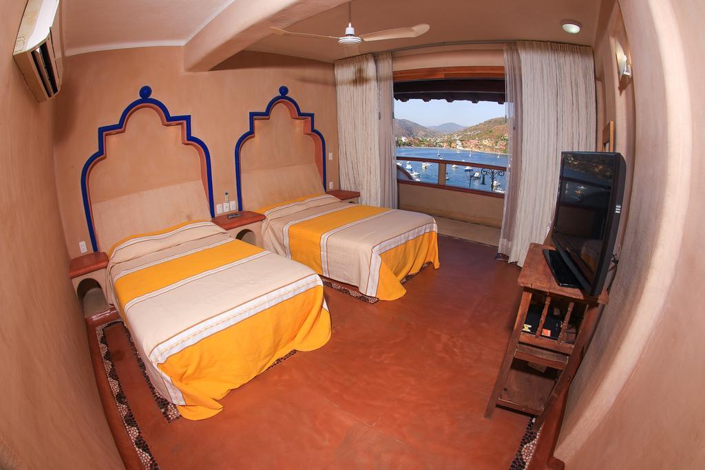 Villa Del Pescador زيهواتانيجو الغرفة الصورة